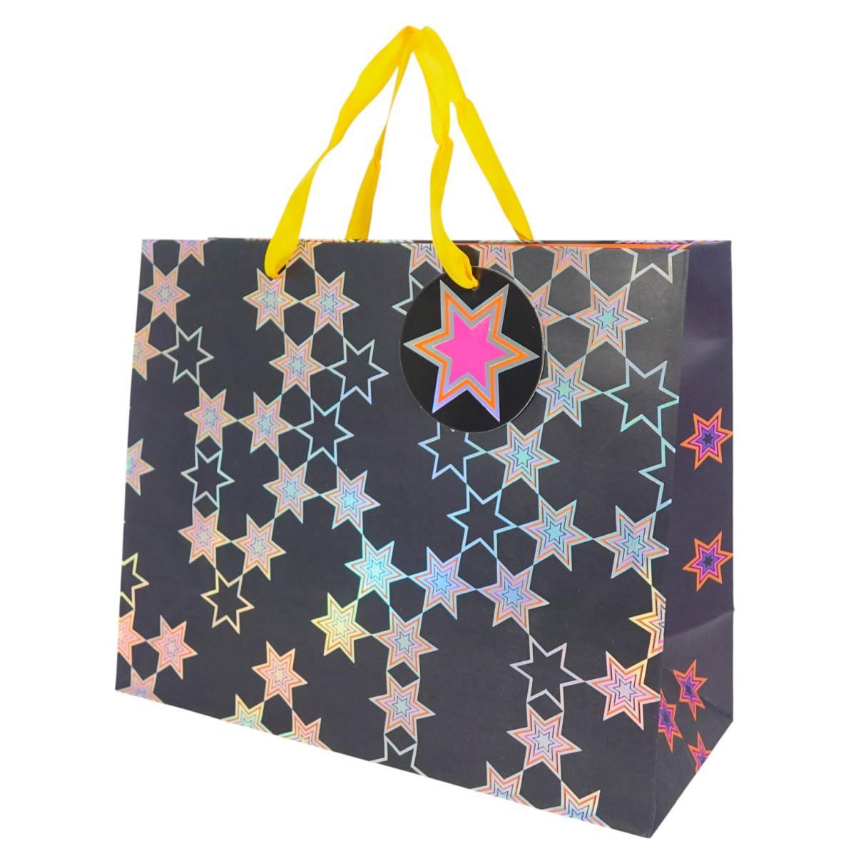 Busta regalo in carta fantasia stelle olografiche 26x32,5x13 cm